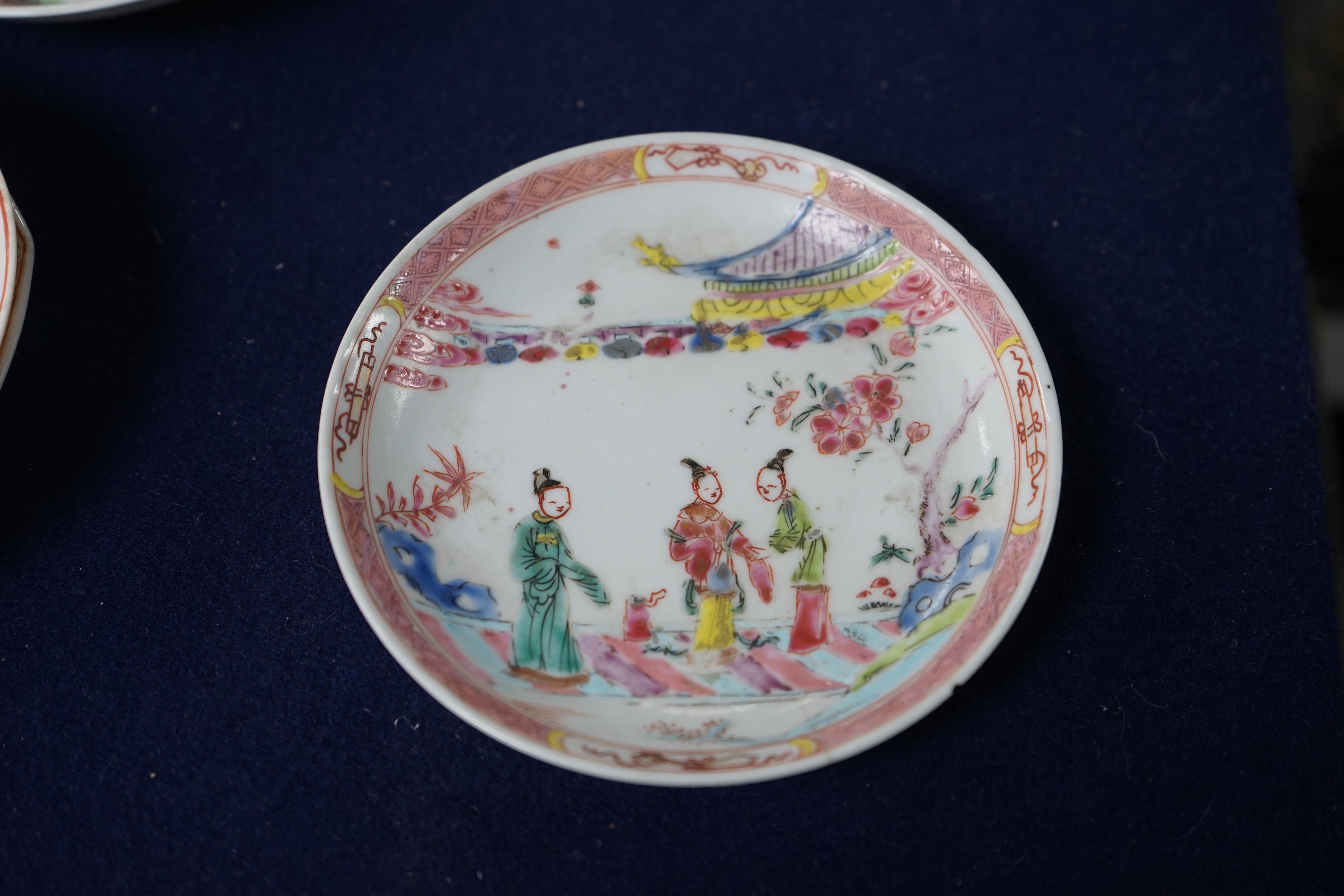 A group of four 18th century Chinese export famille rose saucers